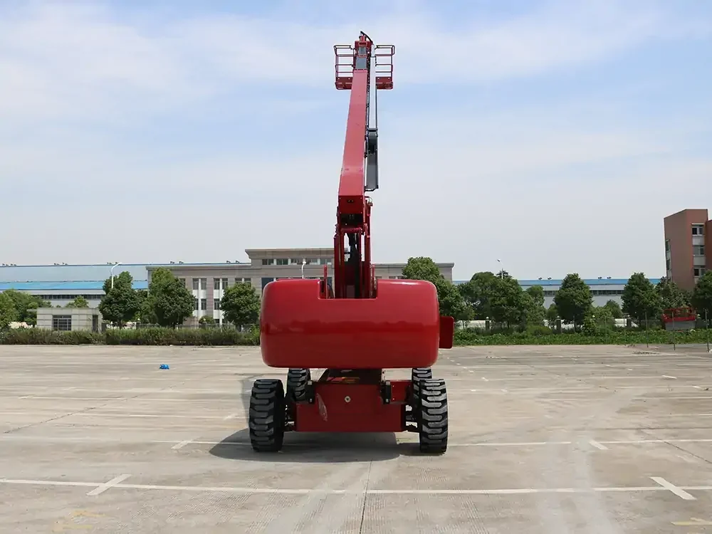 Boom lifts parked in yard